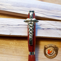 Stylo médical en bois de Cocobolo avec clip caducée doré sur le site Tour du Phoenix.fr